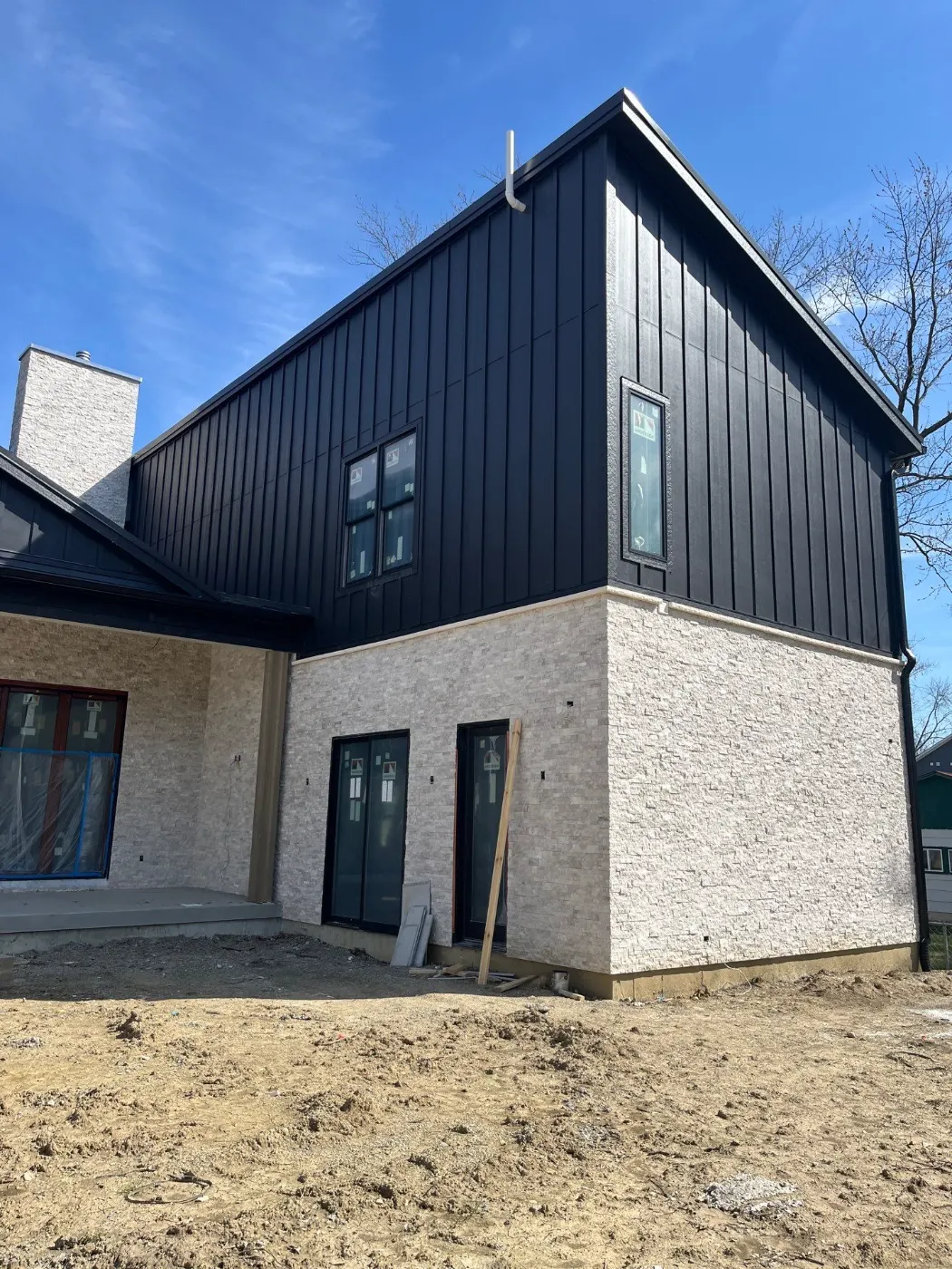 Fiber cement siding installed on a Asherwood home